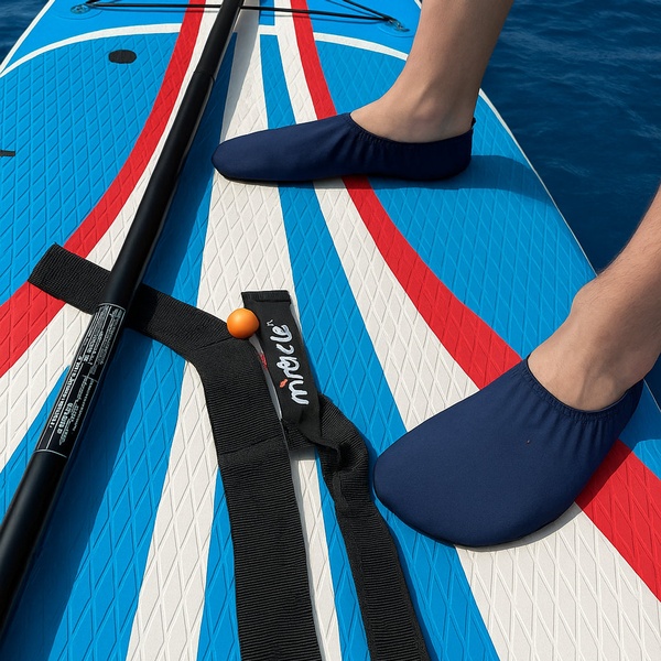 paddle board, sup board, inflatable paddle board, stand up paddle, water sports equipment, product demo, lifestyle, energetic, fresh, blue, red